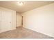 The bedroom has neutral walls and carpet and a closet for storage at 4852 Stone Dr, Conover, NC 28613