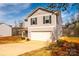 Charming home showcases a two-car garage and low maintenance landscaping at 4852 Stone Dr, Conover, NC 28613