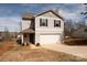 Lovely two-story home with a convenient two-car garage and inviting facade at 4852 Stone Dr, Conover, NC 28613