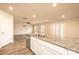 Open kitchen with granite countertops and stainless steel dishwasher at 4852 Stone Dr, Conover, NC 28613