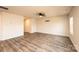 An airy and bright living room featuring durable wood-look floors and recessed lighting at 4852 Stone Dr, Conover, NC 28613