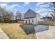 Charming two-story home with a welcoming front porch and well-maintained lawn at 5108 Potter Rd, Matthews, NC 28104