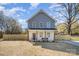 Charming two-story home with a welcoming front porch and a well-maintained, fenced yard at 5108 Potter Rd, Matthews, NC 28104