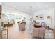 Open-concept living room and kitchen with modern design and stylish decor at 5108 Potter Rd, Matthews, NC 28104