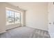 Carpeted bedroom with a large window offering natural light and a view at 5926 Oak Branch Cir, Maiden, NC 28650