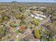 An aerial view showing the home's location within a neighborhood, with community amenities nearby at 602 S Church St, Lowell, NC 28098