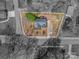 An aerial view of the property, outlining the lot lines and showcasing the house and backyard at 602 S Church St, Lowell, NC 28098