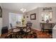 Cozy dining area features a round table and view to the living room at 602 S Church St, Lowell, NC 28098