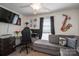 Cozy living room featuring a gray sofa and dark accents at 602 S Church St, Lowell, NC 28098