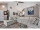 Open concept living room featuring vaulted ceilings and view of dining area at 602 S Church St, Lowell, NC 28098