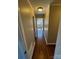 Hallway with hardwood floors, leading to other rooms at 614 Hazelwood Dr, Albemarle, NC 28001