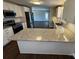 Updated kitchen with stainless steel appliances, granite countertops, and modern cabinets at 614 Hazelwood Dr, Albemarle, NC 28001
