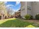 Expansive backyard with healthy lawn and lush plantings, creating a private outdoor oasis at 717 Barossa Valley Nw Dr, Concord, NC 28027
