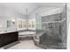 Bright primary bathroom with soaking tub, separate tiled shower, and modern fixtures at 717 Barossa Valley Nw Dr, Concord, NC 28027