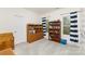 Playful bedroom with wooden furniture, bookshelves, and bright natural light at 717 Barossa Valley Nw Dr, Concord, NC 28027