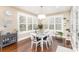 Bright and inviting dining room with hardwood floors, neutral walls and natural light at 717 Barossa Valley Nw Dr, Concord, NC 28027