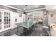 Finished basement with ping pong table and entertainment area at 717 Barossa Valley Nw Dr, Concord, NC 28027