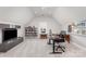 Spacious home office features high ceilings, custom shelving, and modern desk setup at 717 Barossa Valley Nw Dr, Concord, NC 28027