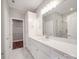 Modern bathroom with white cabinets, quartz countertop, and walk-in shower at 725 Granna Ln, Lancaster, SC 29720