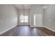 Open-concept living area with large windows, recessed lighting, and gorgeous luxury vinyl plank flooring at 725 Granna Ln, Lancaster, SC 29720
