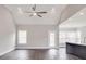 Open-concept living room with high ceilings, recessed lighting, and hardwood floors near a modern kitchen at 725 Granna Ln, Lancaster, SC 29720