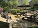 Inviting outdoor fire pit and patio area, perfect for entertaining and relaxation at 7308 Amberwood Ct, Charlotte, NC 28226