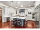 Elegant kitchen with a center island, pendant lighting, and top-of-the-line appliances at 7308 Amberwood Ct, Charlotte, NC 28226