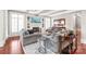 Cozy living room featuring a fireplace, custom built-ins, and ample natural light at 7308 Amberwood Ct, Charlotte, NC 28226