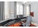 Well-lit office with a large desk, comfortable chair, and window views at 7308 Amberwood Ct, Charlotte, NC 28226