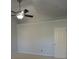 Bedroom with vaulted ceiling, ceiling fan, and neutral carpet at 7814 Rolling Meadows Ln, Huntersville, NC 28078