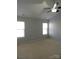 Bedroom with carpet, ceiling fan, and bright natural light at 7814 Rolling Meadows Ln, Huntersville, NC 28078