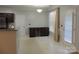 Well-equipped kitchen with granite countertops, dark cabinets, and stainless steel appliances at 7814 Rolling Meadows Ln, Huntersville, NC 28078