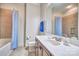 Bathroom featuring tile tub and shower, bright lighting and a vanity with countertop at 820 Cooks Cove Rdg, Lake Wylie, SC 29710