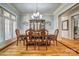 Elegant dining room featuring a large window, hardwood floors, and neutral paint at 820 Cooks Cove Rdg, Lake Wylie, SC 29710
