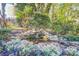 Relax by the beautiful pond and enjoy the calming sounds of the waterfall at 820 Cooks Cove Rdg, Lake Wylie, SC 29710