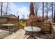 Spacious wooden deck, perfect for entertaining, with views of the lush green backyard at 8260 Graham Rd, Denver, NC 28037