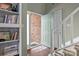 Charming entryway with built-in shelves, a hardwood floor, and a stylishly painted door at 8260 Graham Rd, Denver, NC 28037
