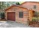 Attached log cabin garage with rustic charm and ample parking space at 1007 Mistywood Ln, Concord, NC 28027