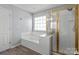 Bathroom with soaking tub and shower at 1016 Council Fire Cir, Indian Trail, NC 28079
