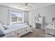 Bedroom featuring a plush bed, neutral carpet, large windows and a modern vanity at 1016 Council Fire Cir, Indian Trail, NC 28079