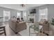 Spacious living room featuring a fireplace, TV, and plush seating for entertaining at 1016 Council Fire Cir, Indian Trail, NC 28079