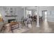 Inviting open-concept space featuring a living area seamlessly connected to a dining space with ample natural light at 1016 Council Fire Cir, Indian Trail, NC 28079