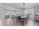 Bright and airy space with connected living and dining areas, modern furnishings, and abundant natural light at 1016 Council Fire Cir, Indian Trail, NC 28079