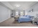 Spacious main bedroom features carpet, natural light, and seating at 1016 Council Fire Cir, Indian Trail, NC 28079