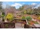 Elevated view of a backyard featuring terraced gardens, winding pathways and mature plantings at 106 Brookwood Ln, Taylorsville, NC 28681