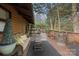 Inviting outdoor deck space with wicker furniture, perfect for relaxing and entertaining at 106 Brookwood Ln, Taylorsville, NC 28681