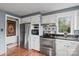 This kitchen is updated with stainless steel appliances, lots of storage, and updated modern fixtures at 106 Brookwood Ln, Taylorsville, NC 28681