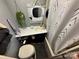 Cozy bathroom featuring a compact sink, toilet, and shower, ideal for efficient use of space at 108 Robin Ln, New London, NC 28127