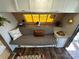 Cozy living room with a comfortable sofa, decorative pillows, and window at 108 Robin Ln, New London, NC 28127