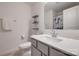 Bathroom featuring a white vanity with a large mirror and gray cabinets and shark shower curtain at 11120 Pagebrook Ln, Charlotte, NC 28214